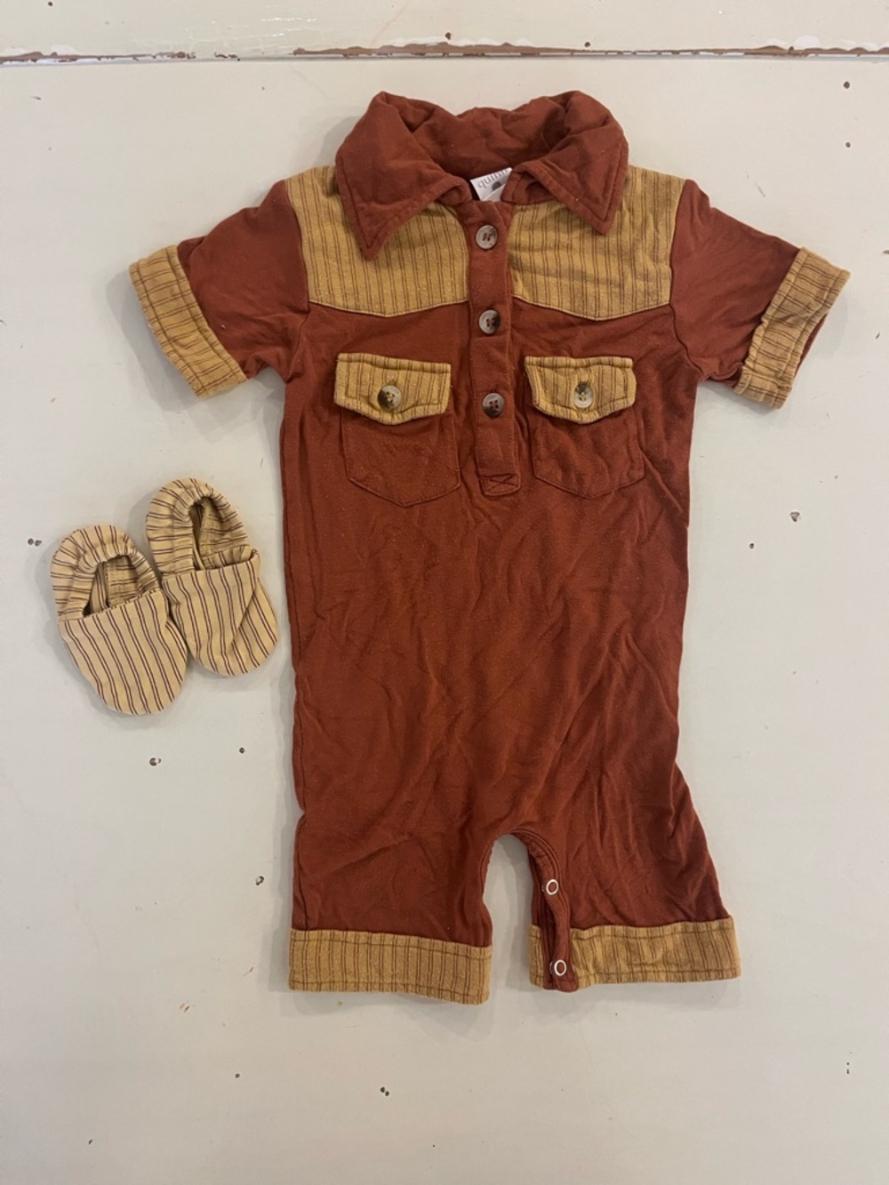 Kate Quinn Auburn Jumpsuit and booties